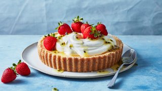 Baked Cheesecake with Strawberries and Passionfruit Syrup